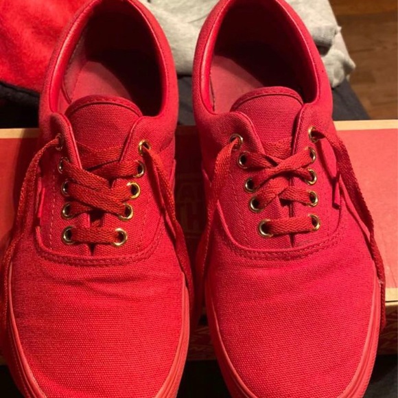all red low top vans